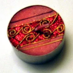 Candlestick for red tea lights with golden decorations