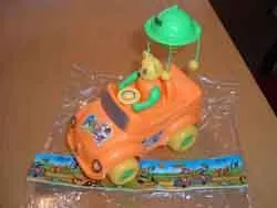 Toy car a bear driver made of yellow and green hard plastic 