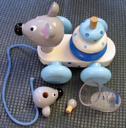 A pull along toy made of wood - Toy mouse on a car L15