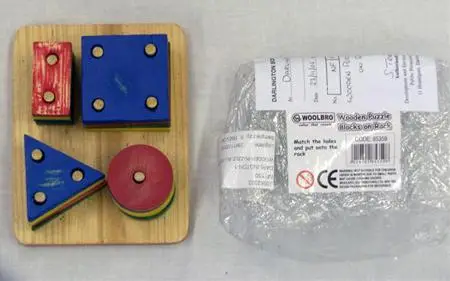 Wooden puzzle blocks on rack “Woolpro”
