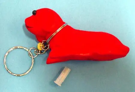 Squeaky toy dog with key ring pendant