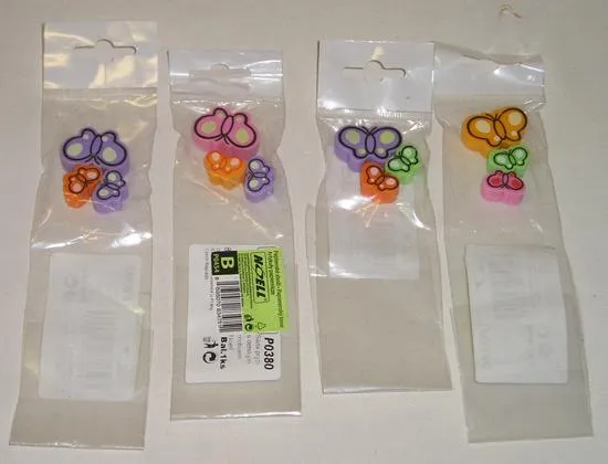 Set of erasers with a child motive in the form of a fish and a butterfly