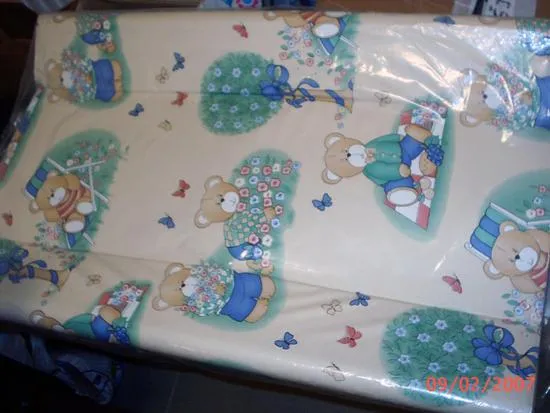 Changing mat, yellow with a bear