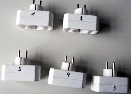 Electric Multiple socket plug “Safety contact / Euro-Adapter” comprising one safety socket