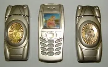 Novelty lighters in the shape of a car and a mobile phone