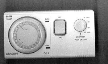 Electric water heating timing device 
