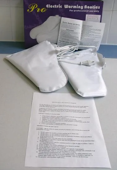 Electric warming booties used to dry nail varnish