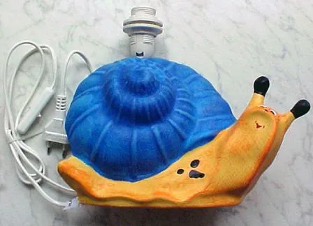 Child ceramic desk lamp shaped as a snail