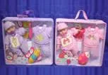 Bag with baby doll (28 cm tall), with clothes and accessories