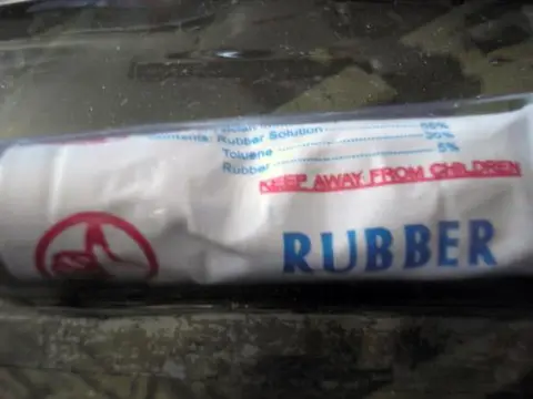 Rubber solution in bicycle repair kit.