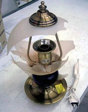 Metallic portable electric desk lamp “Astrolustre”
