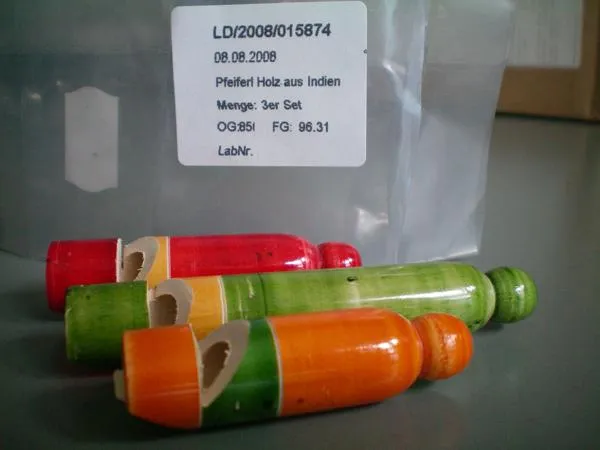 Set of coloured wooden pipes