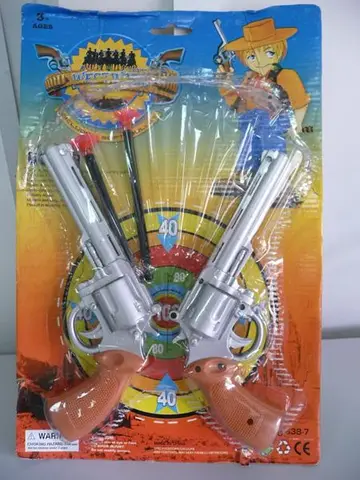 Toy cowboy pistols set with six projectiles with suction cups