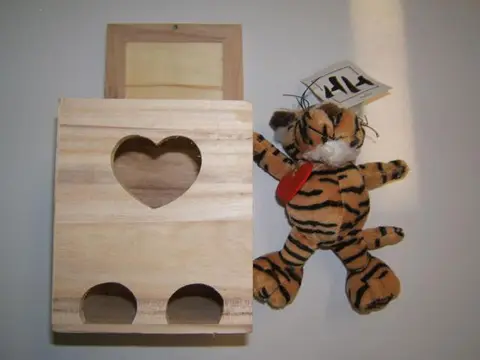 Soft toy in a wooden box