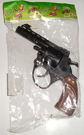 Игрушка - пластиковый капсюльный пистолет "Zabawka pistolet"