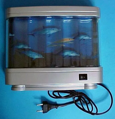 Desk lamp with moving picture foils showing aquarium and provided with a G 23 capped circu
