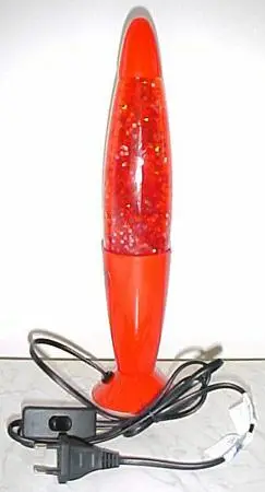 Desk lamp illuminating coloured liquid