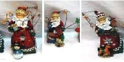 Candle holders in the form of Father Christmas