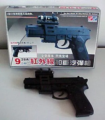 Plastic gun with laser pointer 