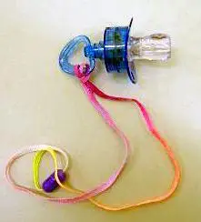 Flashing pacifier with whistle necklace 