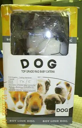 "Top grade rag baby catena dog" – soft toy in leather bag