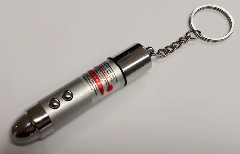 Laser pointer with shock function