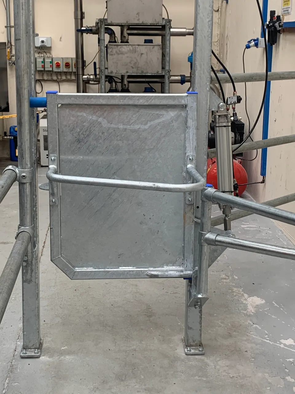 Pneumatic powered gates for use in milking parlour