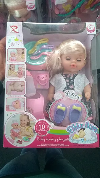 Plastic doll with accessories