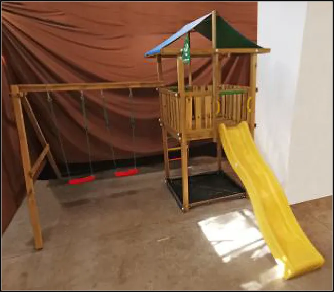 Playground with slide and swing