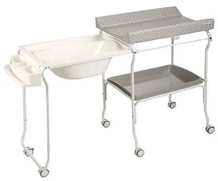 Baby-changing table with pull-out bath