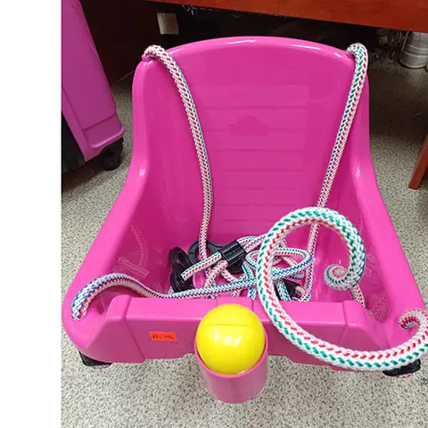 Toy swing with horn