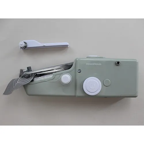 Handheld sewing machine