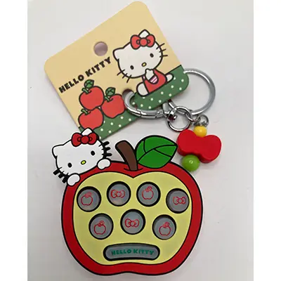 Key ring with push toy