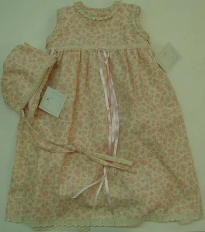 Baby’s long dress and bonnet