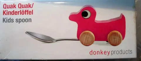 Деревянная утка с ложкой