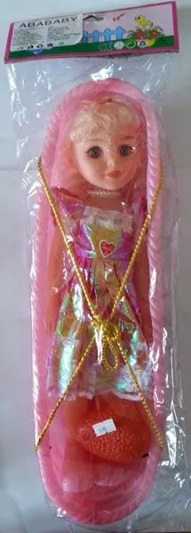 Plastic doll and bassinet