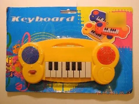 Игрушечный музыкальный инструмент