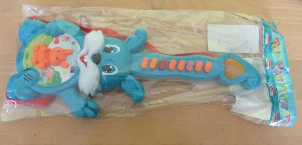 Plastic toy guitar