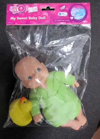 Plastic doll with duck