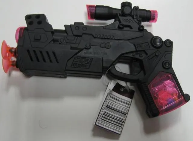 Toy gun with sweets
