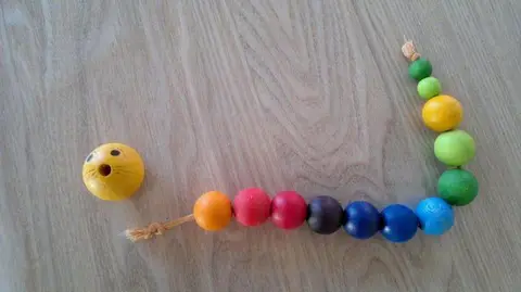 Wooden toys – caterpillar rattle